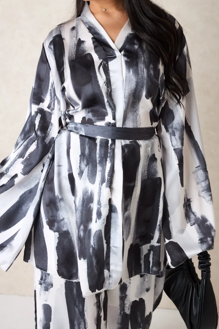 Ensemble 2 pièces blouse ceinturée + pantalon blanc et noir
