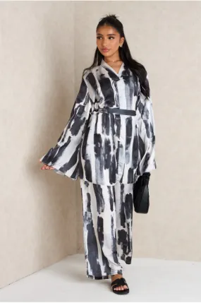 Ensemble 2 pièces blouse ceinturée + pantalon blanc et noir