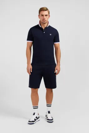 Polo bleu marine à détails tricolores